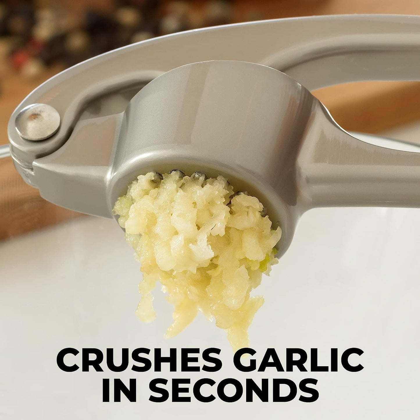 Garlic Press with Soft, Easy to Squeeze Handle - Includes Silicone Garlic Peeler & Cleaning Brush